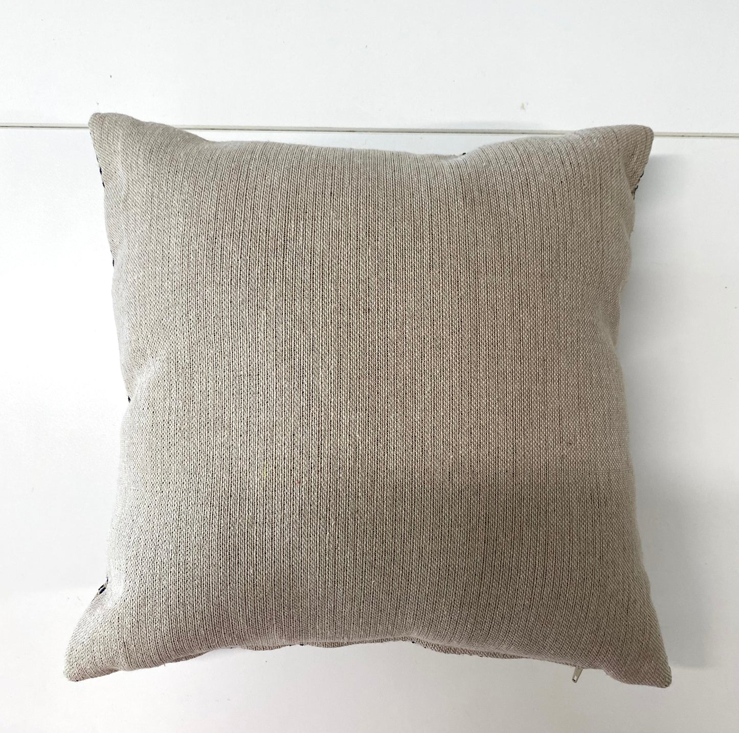 Navy, pink and beige spots cushion